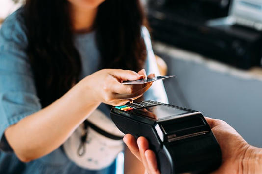 A woman making a card payment