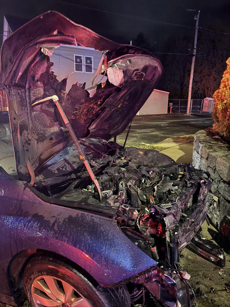 Car catches fire after crash in Milford