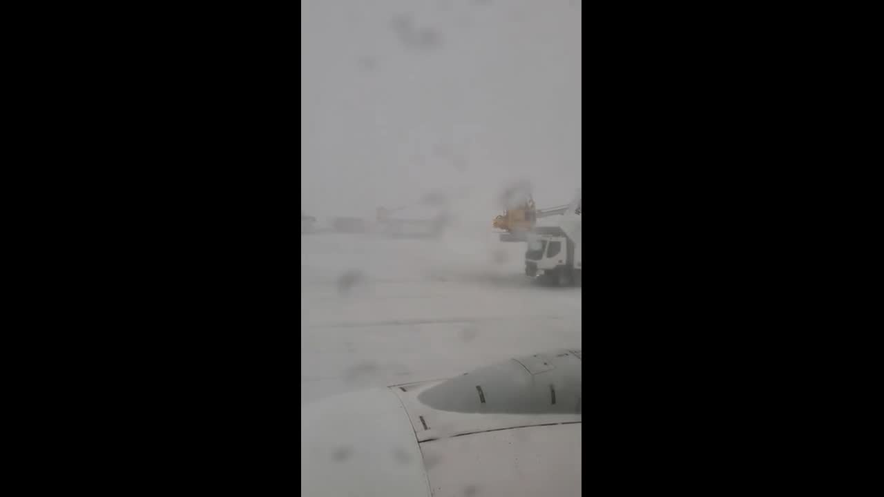 Heavy snowfall disrupts Calgary airport in Alberta, Canada