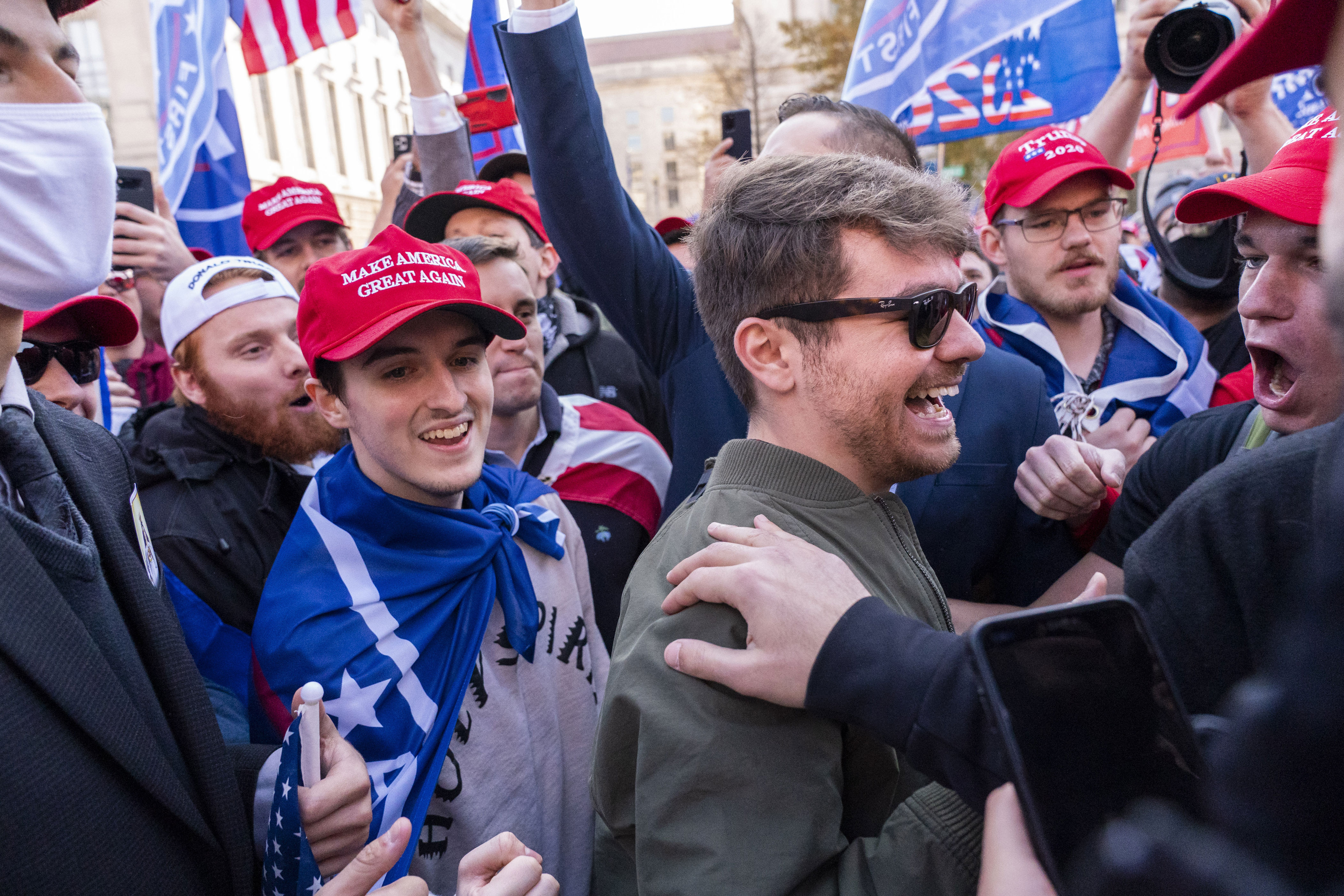 Podcaster Nick Fuentes, in sunglasses, before speaking at a pro-Trump march on Nov. 14, 2020 in Washington.