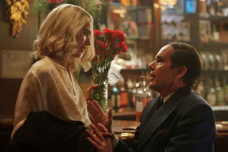 Margaret Qualley, left, and Ethan Hawke in a scene from "Blue Moon." (Sabrina Lantos/Associated Press)