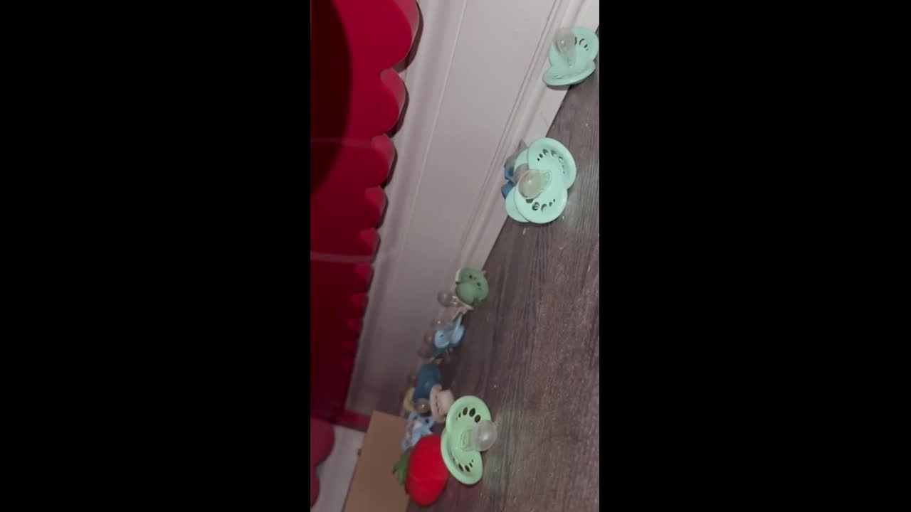 Missing pacifiers found between bed and wall in Alexandria, USA