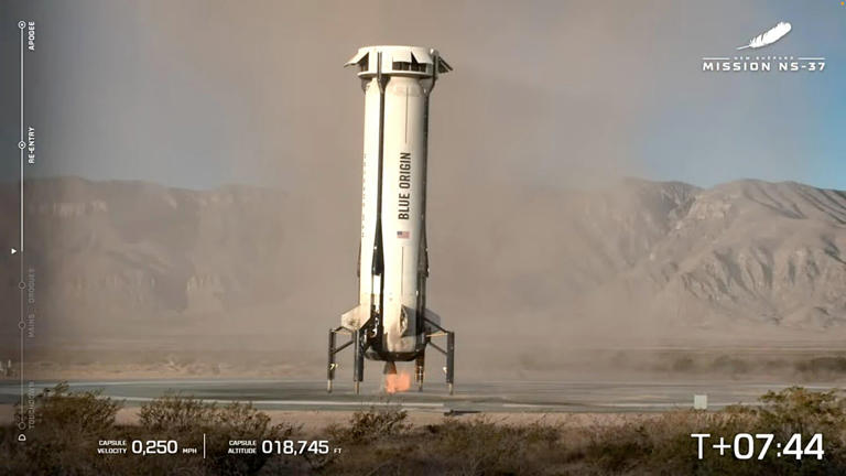 The reusable New Shepard booster executed an on-target landing after propelling the New Shepard capsule out of the lower atmosphere. / Credit: Blue Origin webcast