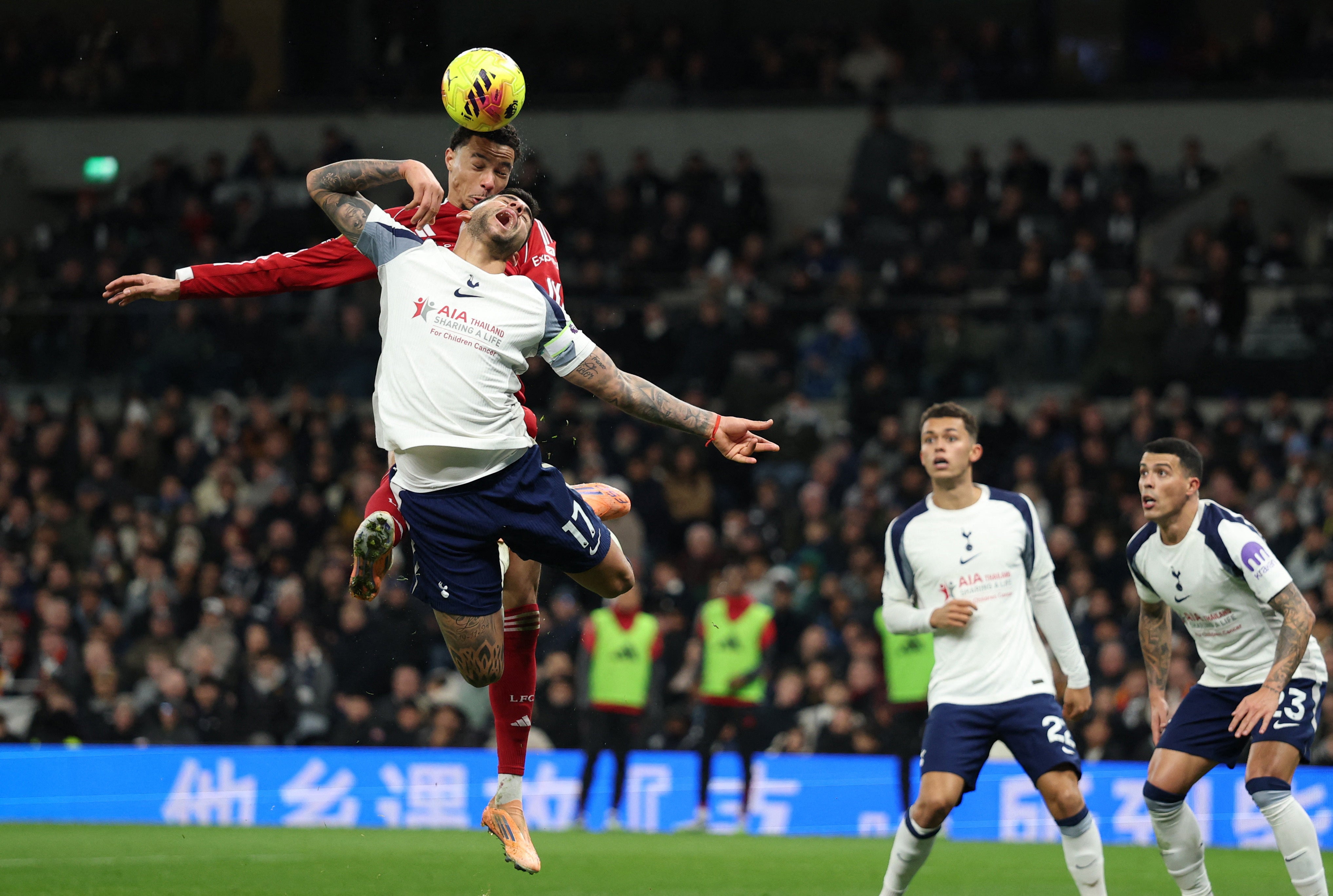 Liverpool's Hugo Ekitike beats Tottenham's Cristian Romero to the ball (Action Images via Reuters)