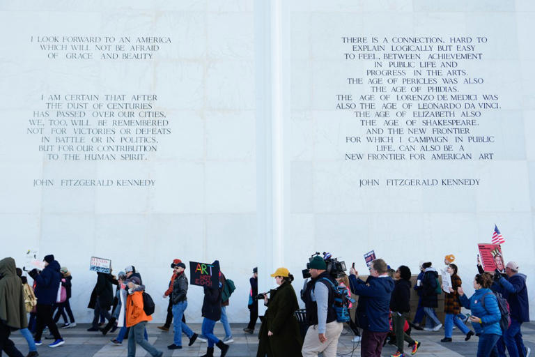 Demonstrators protest at the John F. Kennedy Memorial Center for the Performing Arts, a day after a Trump-appointed board voted to add President Donald Trump’s name to the Kennedy Center on December 20 in Washington. (AP Photo/Julia Demaree Nikhinson)