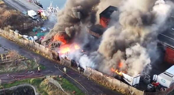 Huge fire erupts as locals told to keep windows and doors closed