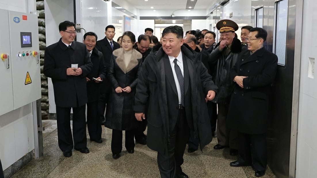 Kim Jong-un inspects factory with family, policy push