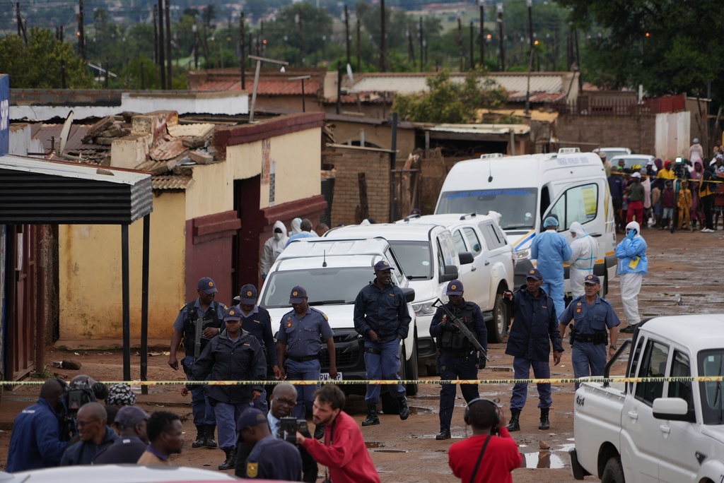 Multiple gunmen open fire at a South African pub, killing 9 and wounding 10<br><br>