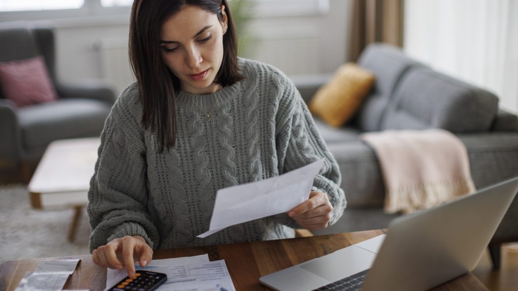 Woman calculating bills