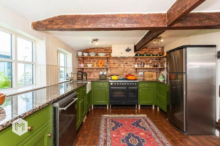Inside quaint Grade II-listed cottage in pretty Greater Manchester ...