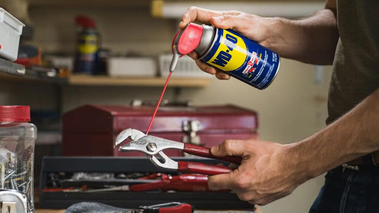 Is it safe to use WD-40 on rusty tools?