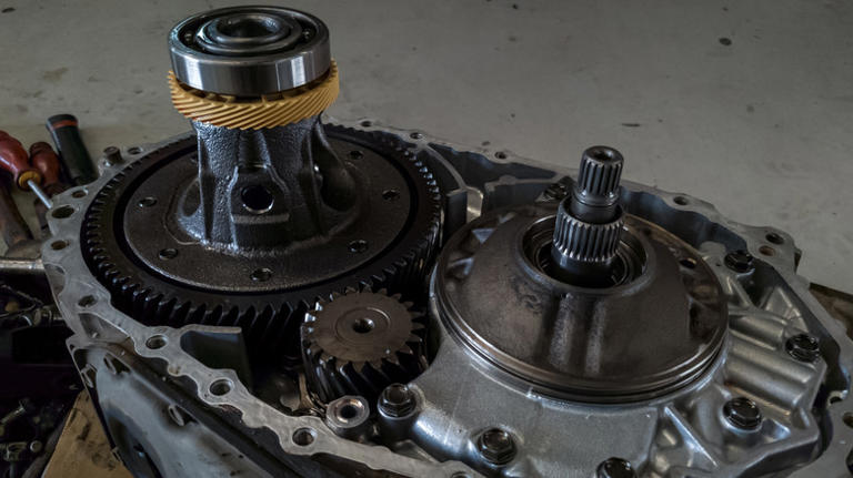 When did the Corvette switch to a transaxle design?