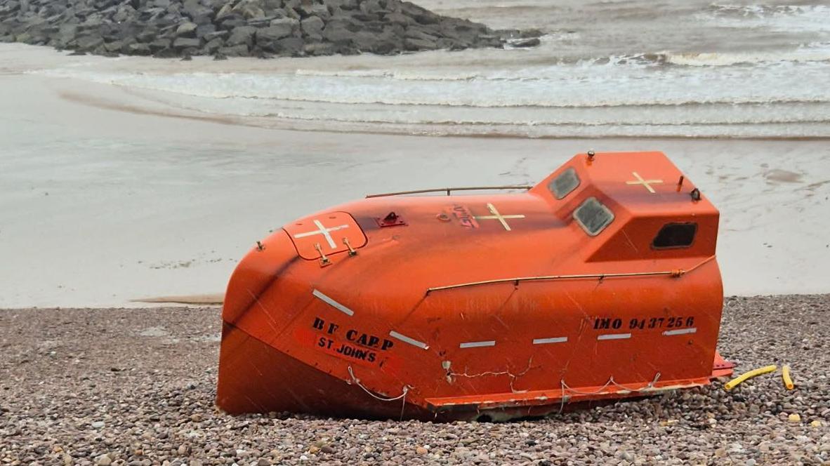 Missing lifeboat washes up on Devon beach