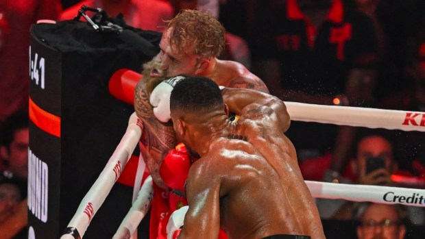 Jake Paul suffers broken jaw in 2 places, loses teeth in aftermath of vicious Netflix knockout by Anthony Joshua<br>