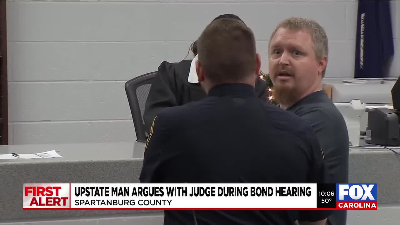 Man accused of stealing patrol car in chase argues with judge at bond hearing