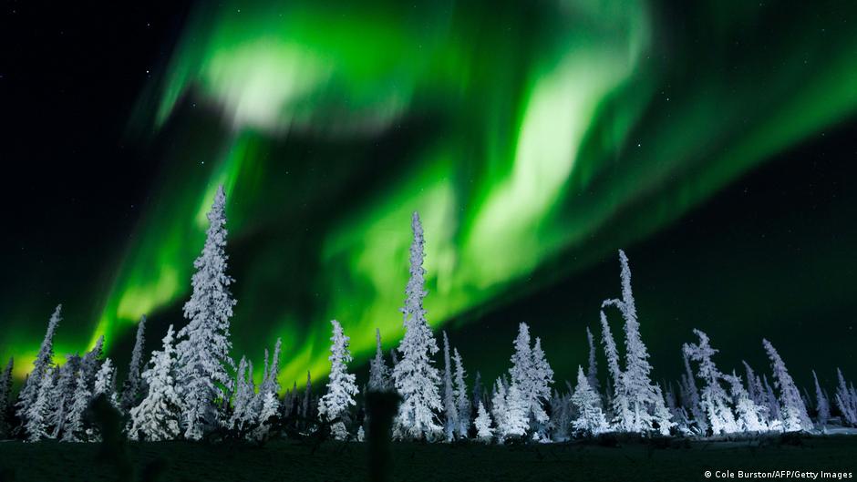 Uncovering the mystery behind colorful aurora skies