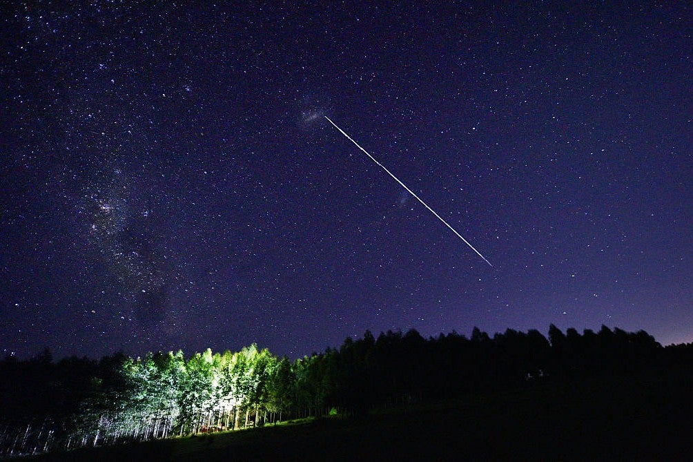 A long-exposure image of SpaceX's Starlink satellites passing over Capilla del Sauce in Uruguay. (Mariana Suarez/ AFP via Getty Images)