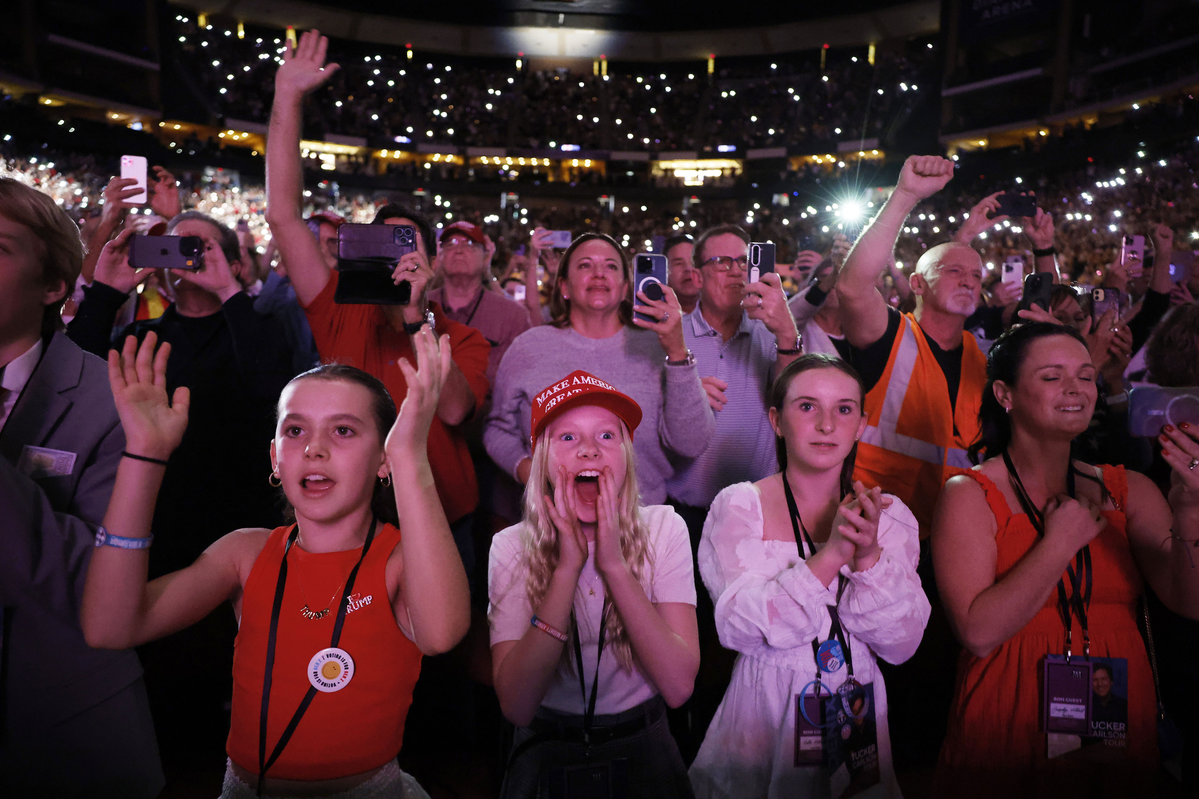 Trump supporters at a 2024 Phoenix event where Carlson interviewed the then-presidential candidate.