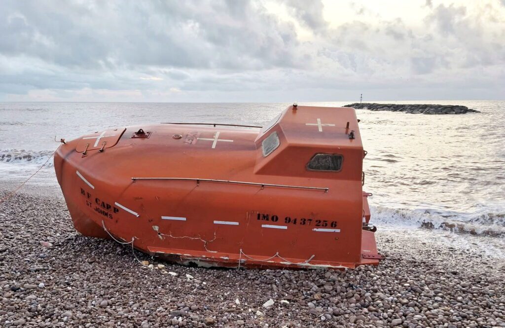 Missing lifeboat from cargo ship washes up on UK beach
