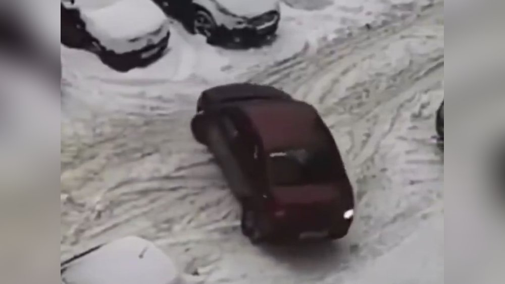 Car turns 180 degrees while stationary into parking space