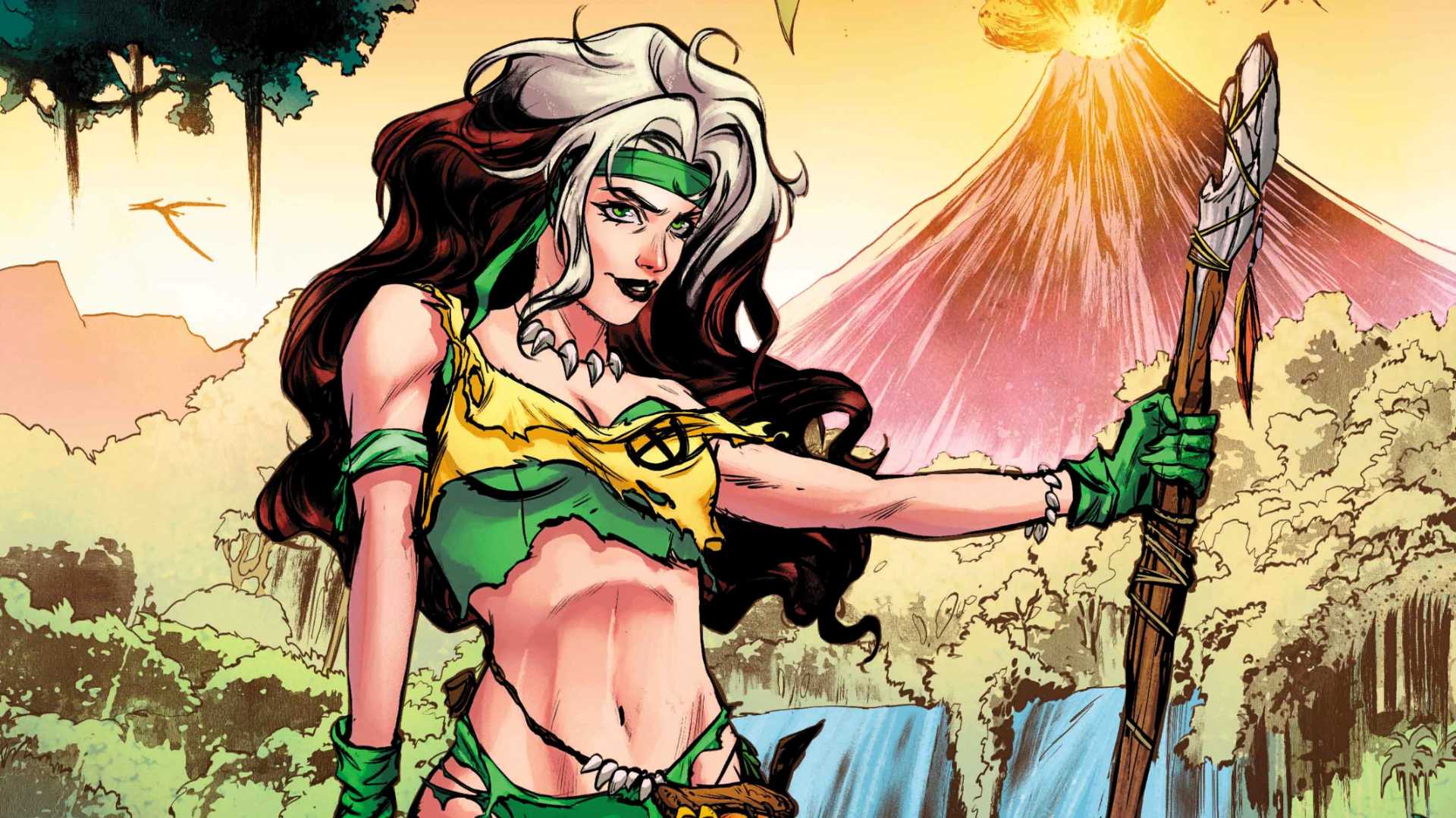 Rogue holds a spear in front of a volcano in Marvel's Savage Land