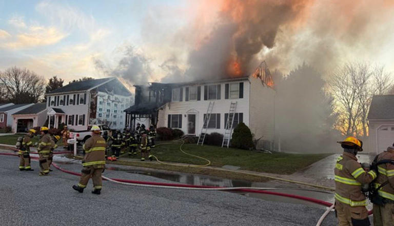Hero neighbors charge into burning Maryland home to save trapped ...