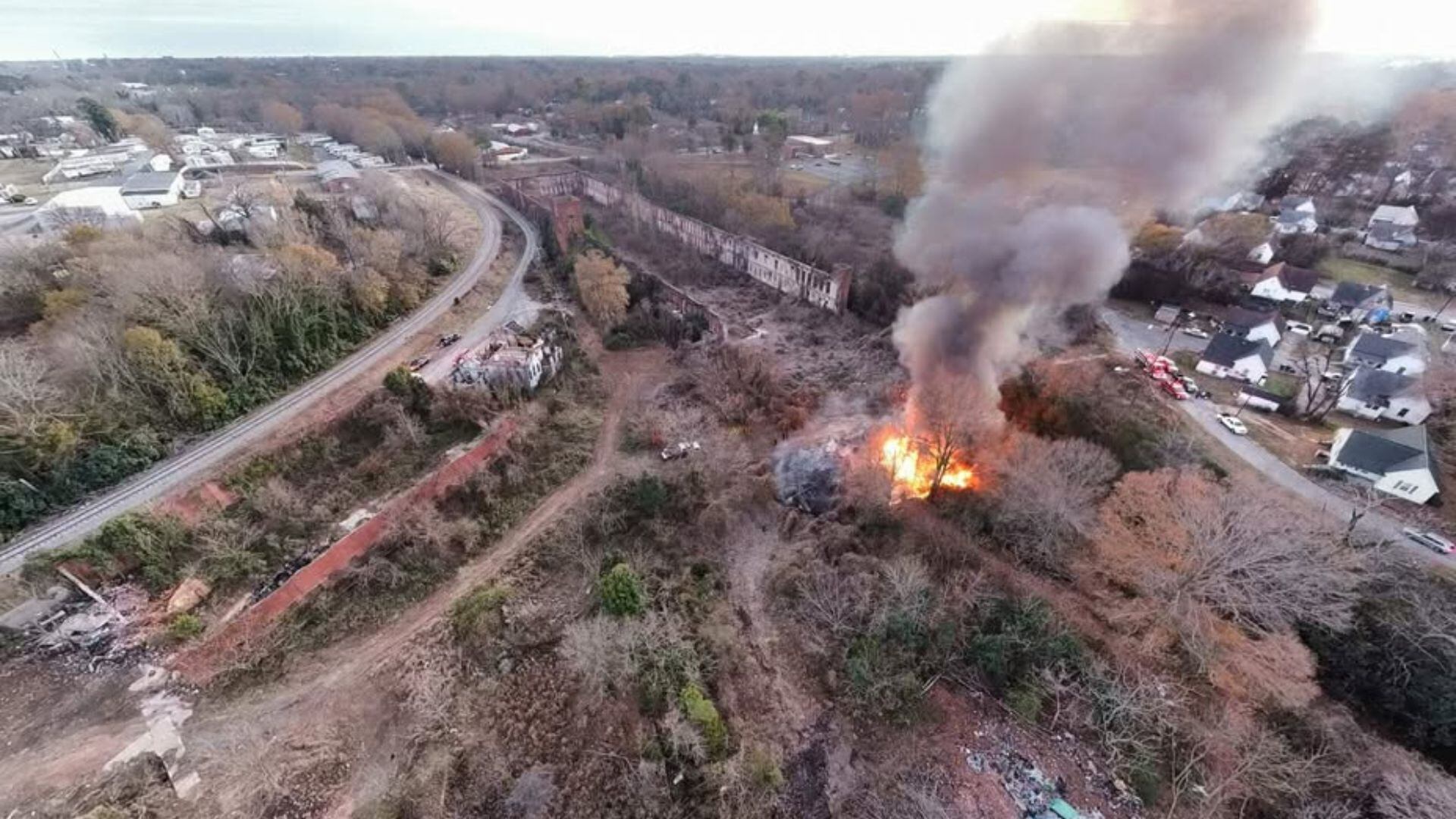 Crews respond to brush fire near historic Anderson textile mill