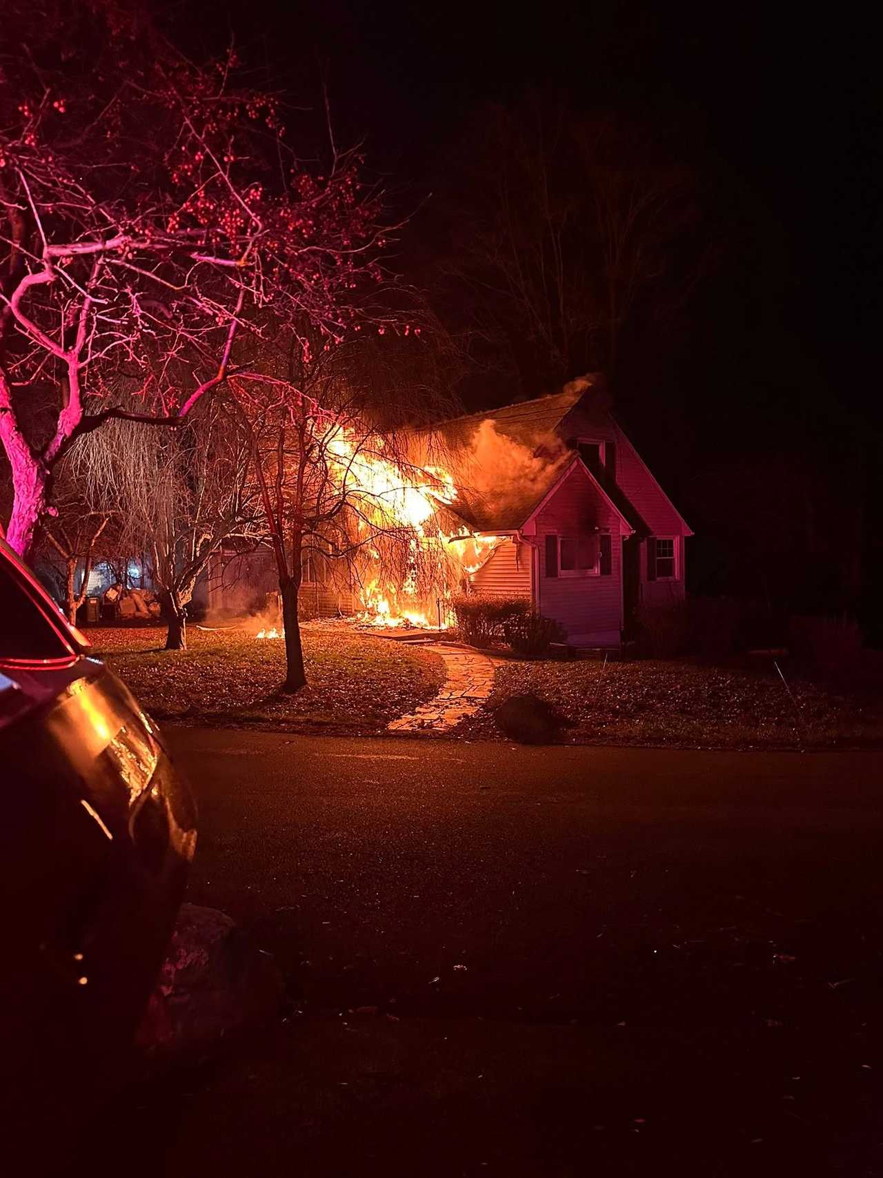 Overnight fire tears through home in Orange County, crews battle heavy ...