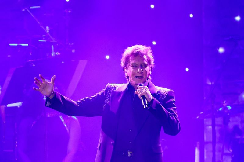 Barry Manilow shares cancer diagnosis as surgery prompts concert cancellations<br><br>