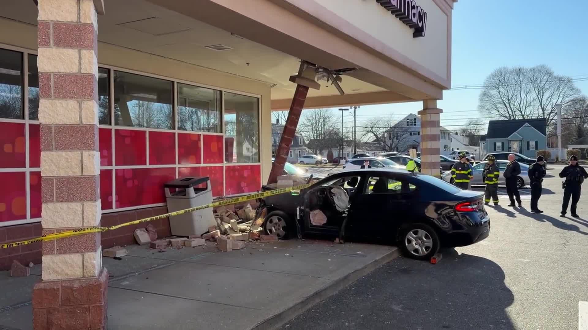 2 people taken to hospital after car crashes into CVS on North Shore