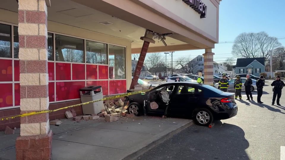 Car crashes into CVS in Peabody
