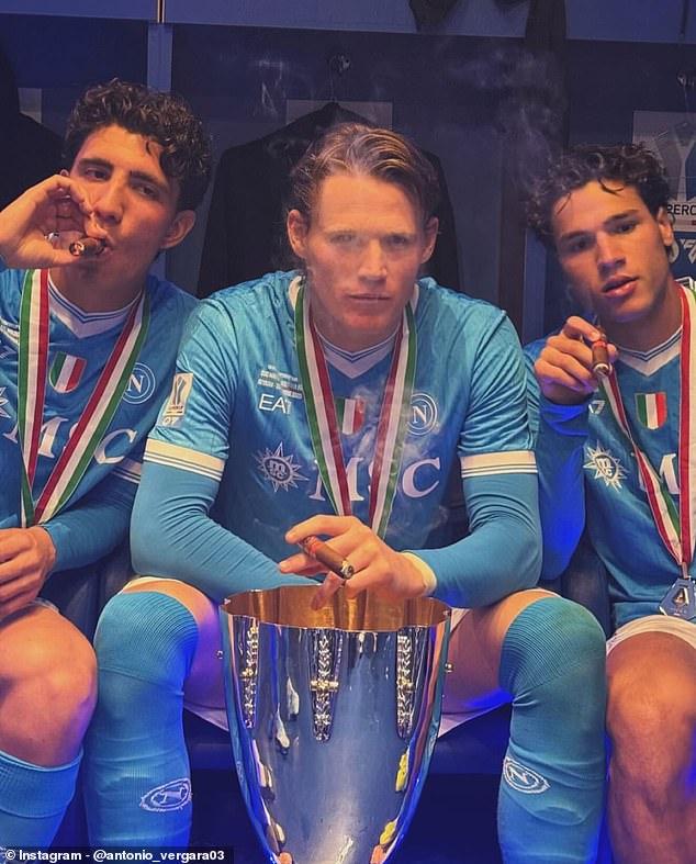 Scott McTominay is celebrating Napoli's Supercoppa Italiana win by lighting up a big cigar