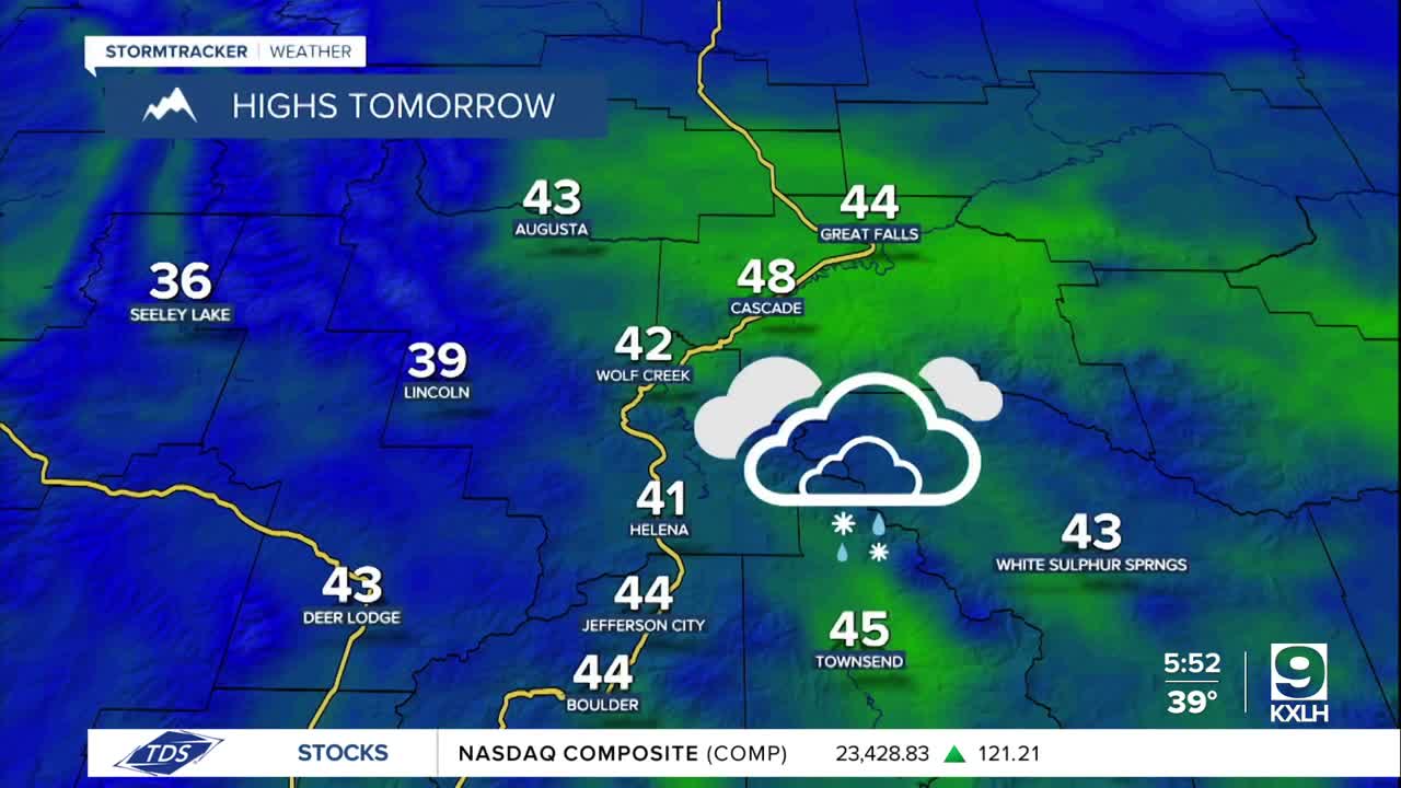 Mostly cloudy and mild with isolated rain/snow showers on Tuesday