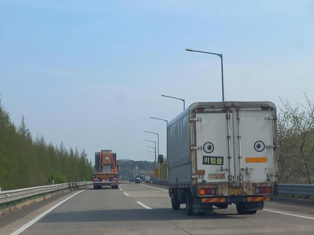 Stop tailgating monsters: Those giant eyes on truck rears are watching ...