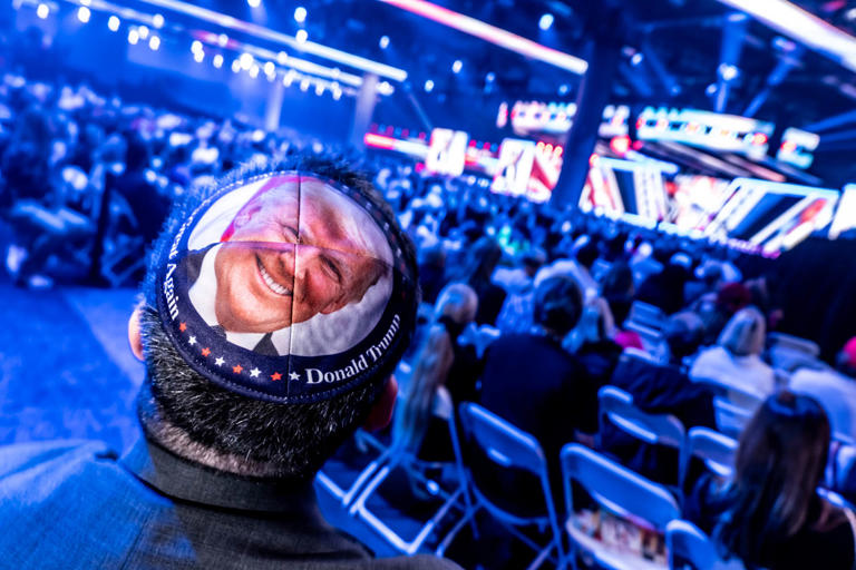 An attendee sports a yarmulke with Trump's face. (Mark Peterson for NBC News)
