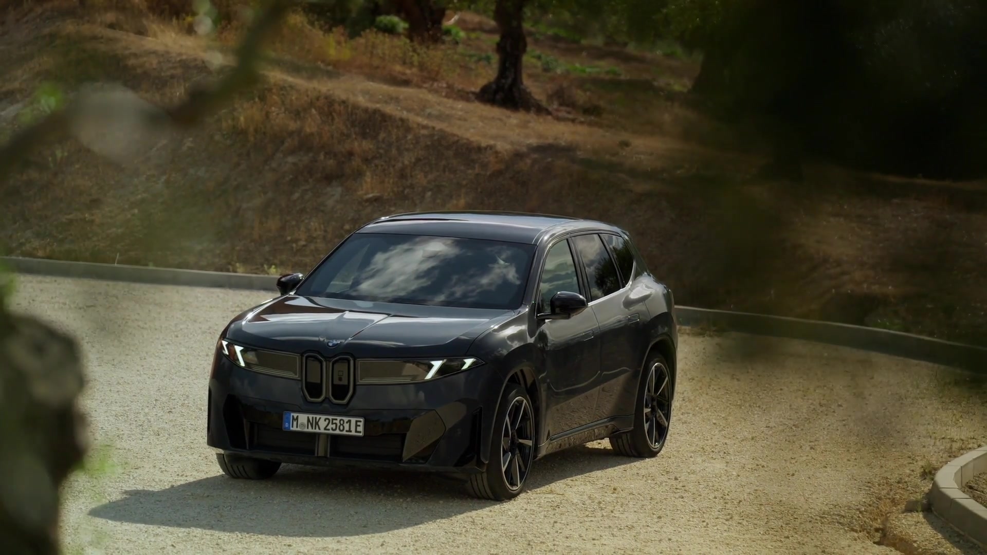 The new BMW iX3 50 xDrive design preview in Polarized Grey Metallic
