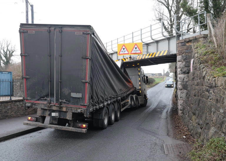 The scene following a lorry collision with a railway bridge on Lissue Road PICTURE: BRIAN LINCOLN