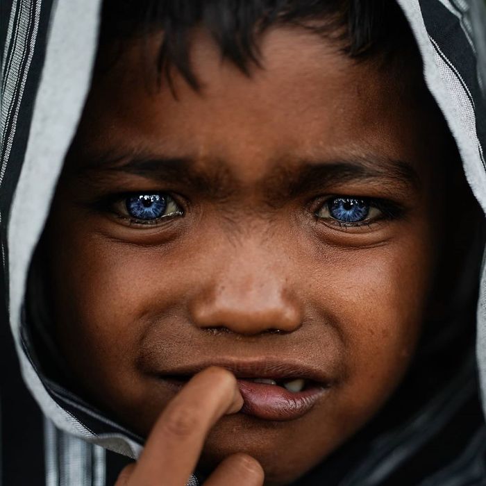 Photographer Documented An Indigenous Tribe With Strange Genetic Fluke That Causes Their Eyes To Turn Blue