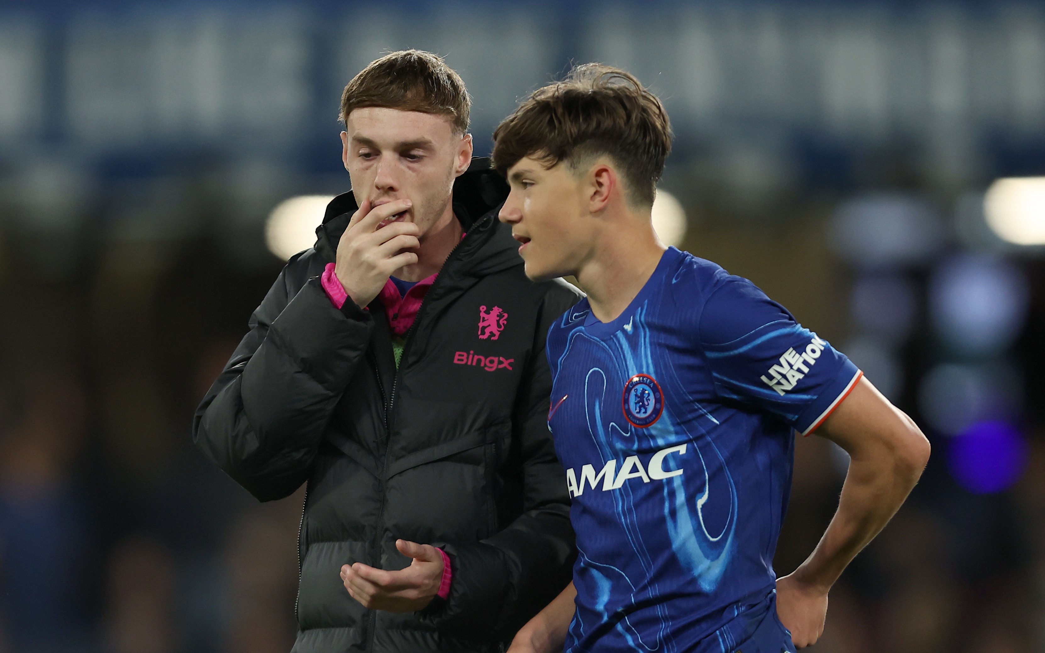 Reggie Wash and Cole Palmer (Chelsea FC via Getty Images)