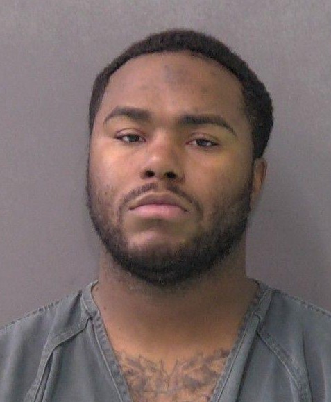 Shots fired into car, tires flattened, man arrested