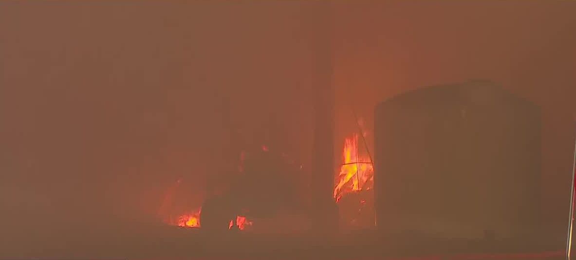 Crews battle early morning barn fire in Owosso Township