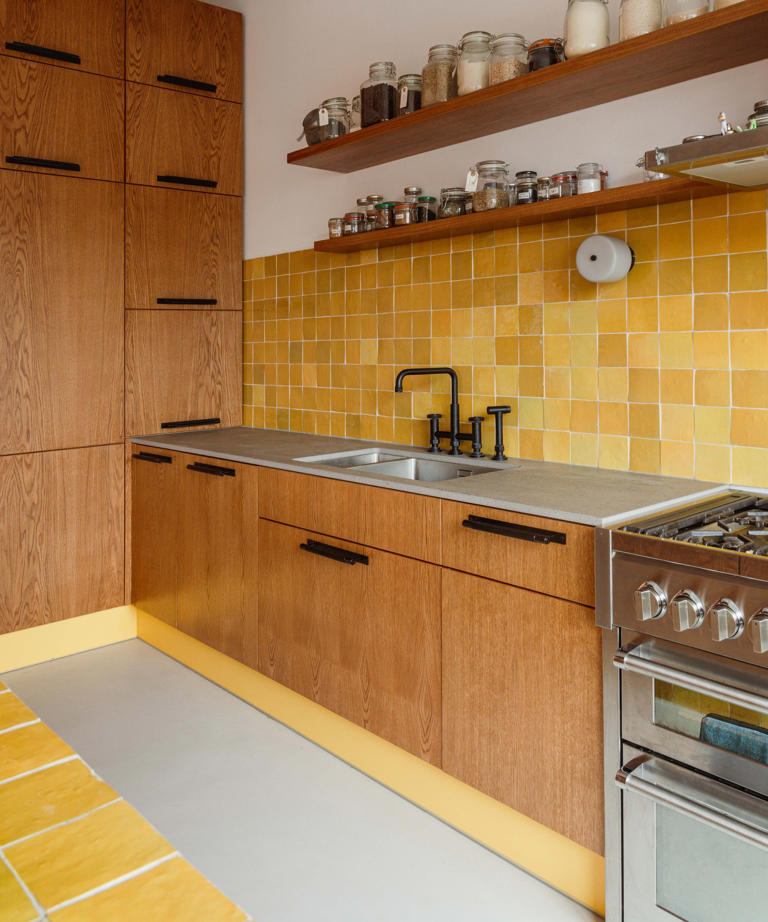 Should I use skirting board instead of kickbacks in my kitchen?
