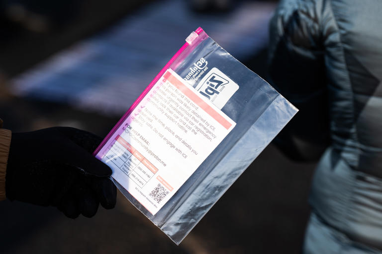 TAKOMA PARK, MD ‐ December 15: Instruction card for Locals and members of the St. Camillus Intercultural Choir in a parking lot that is typically used by ICE as a staging location in Takoma Park, MD on Monday December 15, 2025. Community organizers are gathering and scheduling events in the parking lot for the upcoming weeks to reclaim the space from ICE agents. (Photo by Demetrius Freeman/The Washington Post)