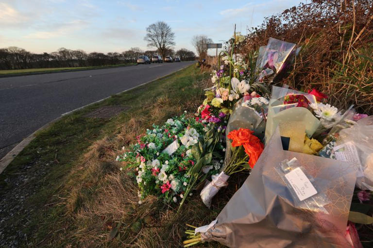 Second victim killed in country road crash named as tributes left at scene
