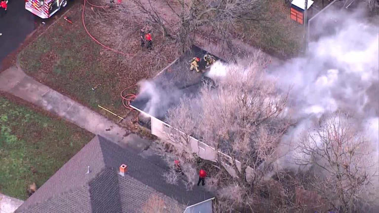 Crews put out fire after flames, heavy smoke seen coming from Norman home