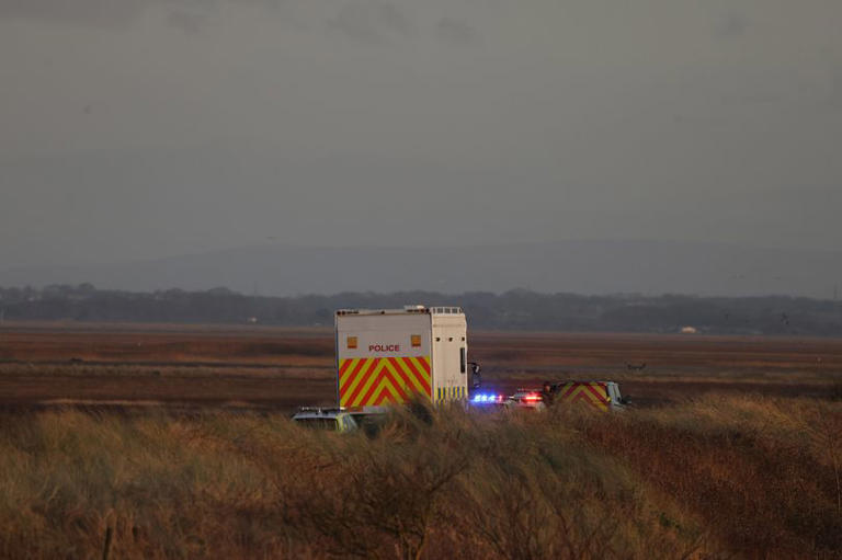 Man hit by car as police shut main road