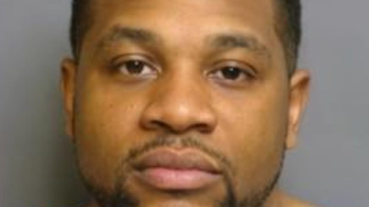 Man accused of robbing customers, employees at gunpoint inside ...