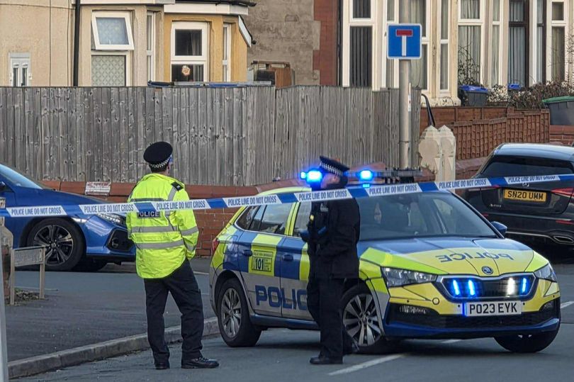 Police cordon off Blackpool street after serious attack as two men arrested