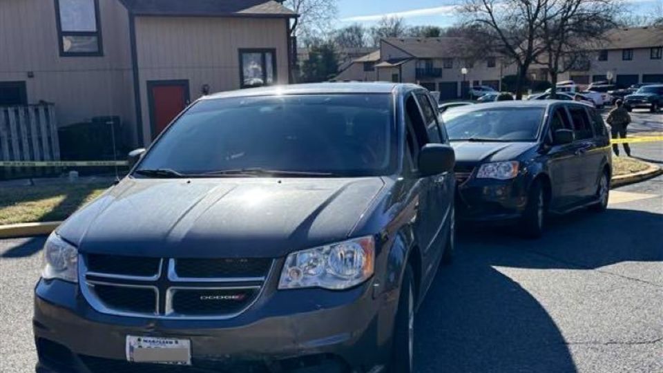 A photo shared by the Department of Homeland Security shows two dark minivans involved in Wednesday's shooting incident. - Department of Homeland Security