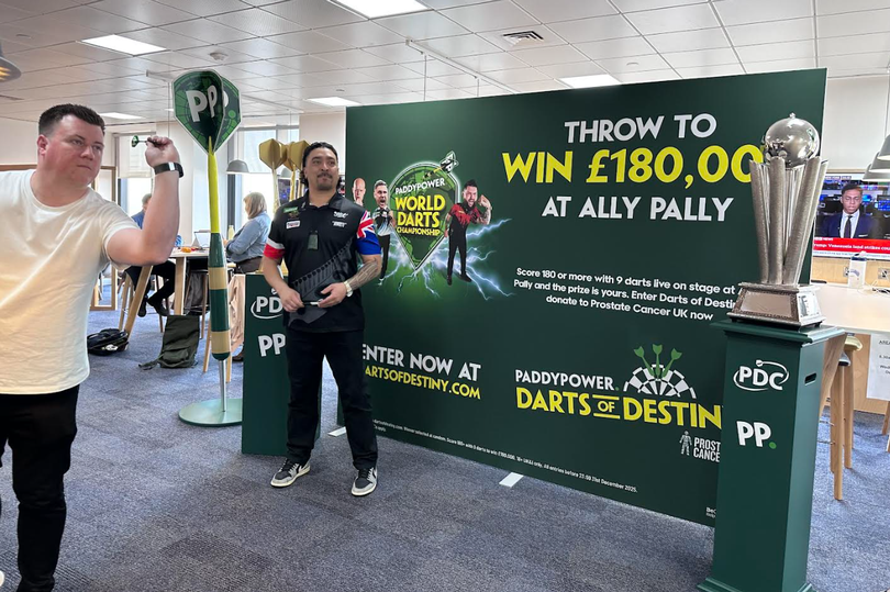 'I took on PDC darts star next to World Championship trophy – and even took the lead'